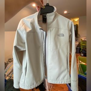 Slightly off white North Face winter jacket